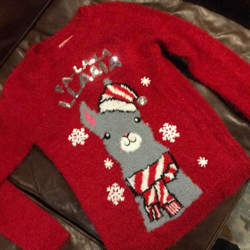 Beautiful and festive Justice kids sweaters!